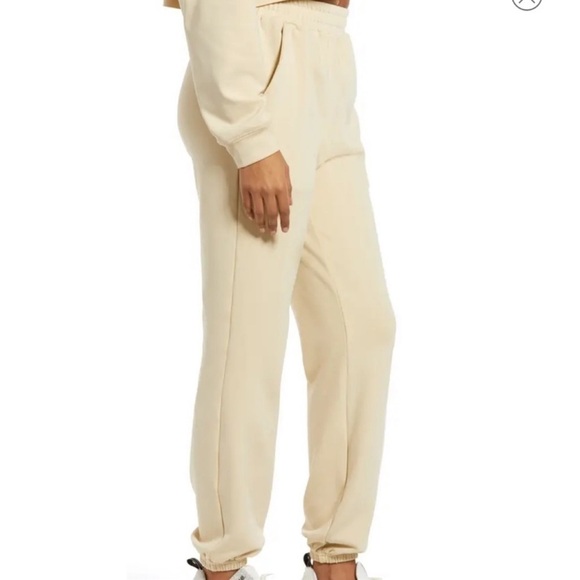 NWT WEWOREWHAT x REVOLVE Brushed Back Terry Cream Joggers, Large - Picture 5 of 10